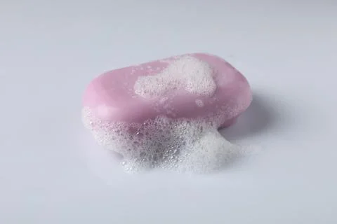 Soap with fluffy foam on white background 写真素材