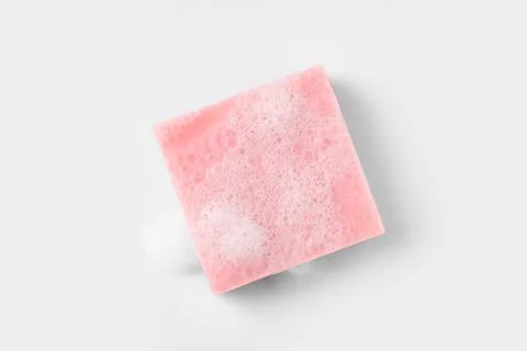 Soap with fluffy foam on white background, top view Foto stock