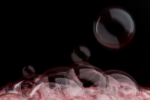 Soap foam on black background Stock Photos
