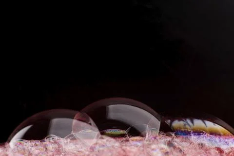 Soap foam on black background Stock Photos