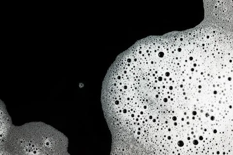 Soap foam on black Stock Photos