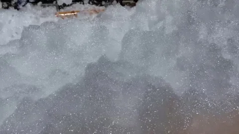 Soap foam with bubbles, White soapy foam texture. Shampoo foam with bubbles.. Stock Footage 280920470