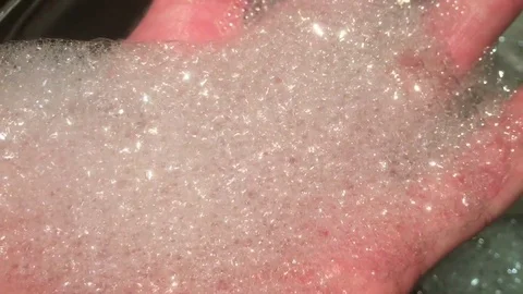 Soap foam in a hand Stock Footage 120283098