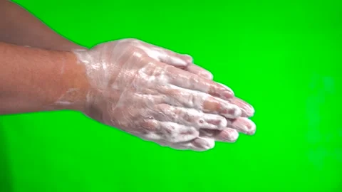 Soap Hands on a Green Background. Video stock 148719901