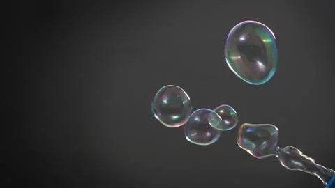 Soap or shampoo bubbles floating in the air by wind blow Stock Photos