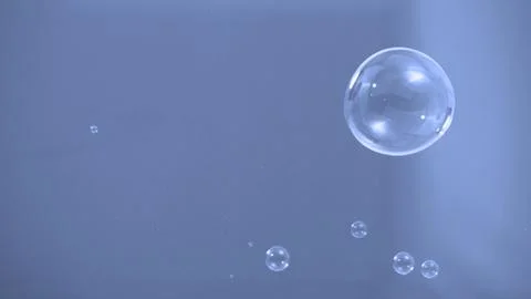 Soap or shampoo bubbles floating in the air by wind blow Stock Photos