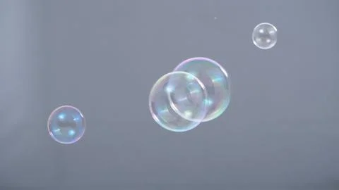 Soap or shampoo bubbles floating in the air by wind blow Stock Photos