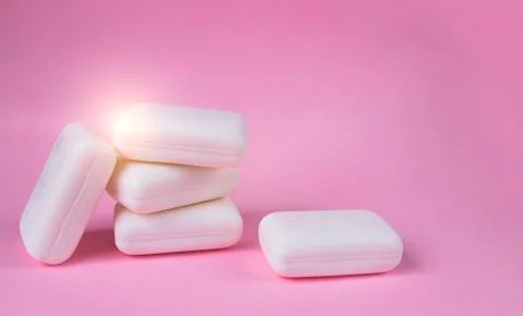 Soap on pink background Stock Photos