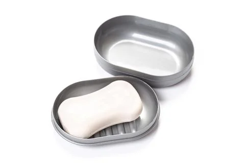 Soap in PLASTIC COLORED soap dish isolated on white background 스톡 사진