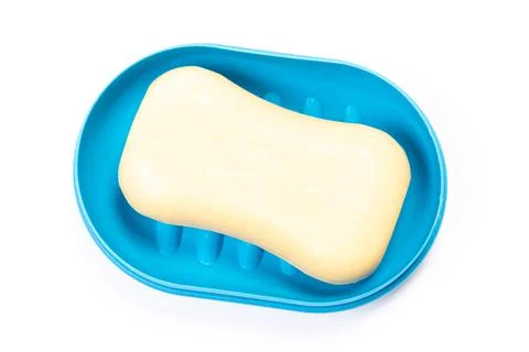 Soap in PLASTIC COLORED soap dish isolated on white background 스톡 사진