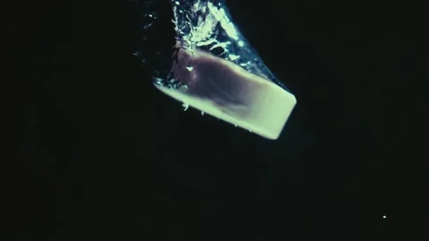 Soap Sinks in Water Stock Footage 300892301