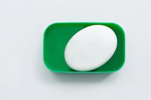 Soap in a soap dish on a white background Stock Photos