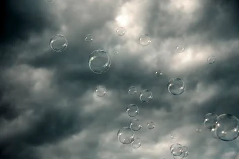 Soap sud bubbles &amp; dramatic sky Stock Photos