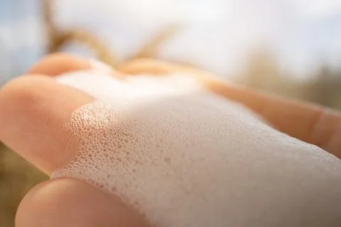 Soap suds on hand Stock Photos