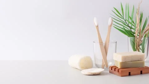 Soap, toothbrush with palm on white background Stock-Footage 306481958