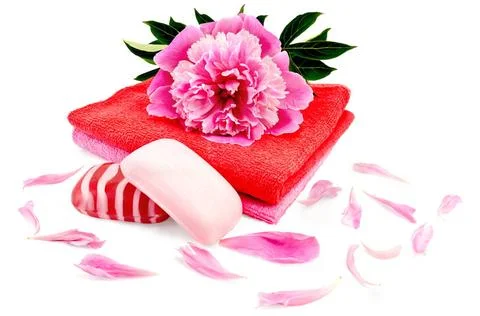 Soap with a towel and a pion Solid red and pink striped soap, two towels a... 스톡 사진