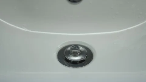 Soap water in a white sink Stock Footage 127628149