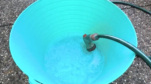 Soapy Bucket Filling Up Stock Footage 246464014