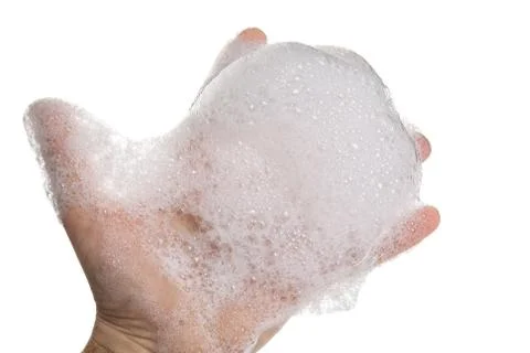Soapy foam on man's hand Stock Photos