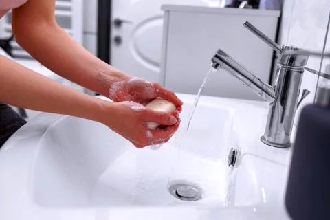 Soapy hand cleaning and hygiene. Hand washing.. Stock Photos