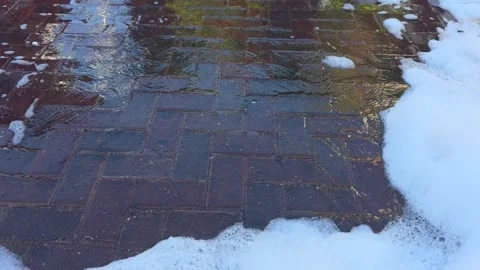 Soapy Water and Foam Flowing Into Outdoor Drain Stock Footage 343602595