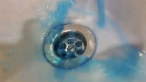 Soapy water flows into the sink Stock Footage 77413728