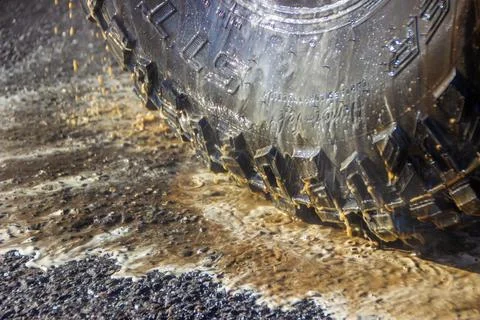 Soapy wheel being sprayed Stock Photos