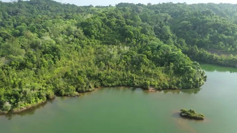 Soaring above Batam's emerald waters and verdant hills, an unspoiled Indonesia Stock Footage 326188933