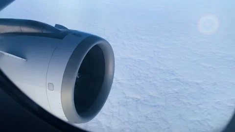 Soaring above the clouds on an airplane Stock Footage 267578691