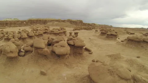 A Soaring Aerial Flying Over A Desolate Desert In Goblin Valley. Stock Footage 51138743