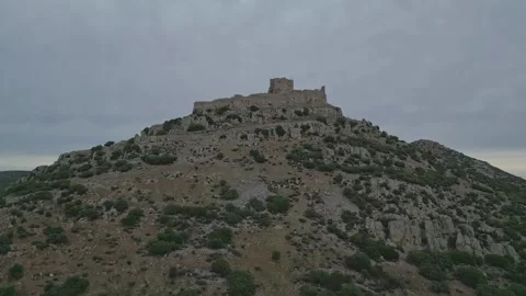 Soaring Ascent to Aldea del Rey's Historic Castle Stock Footage 263446438