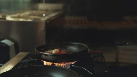 Soaring Burning Vegetables in Pan Stock-Footage 113283643