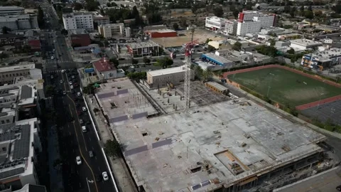 Soaring High Circling a Tower Crane at a Downtown LA Construction Site Vídeo Stock 240252562