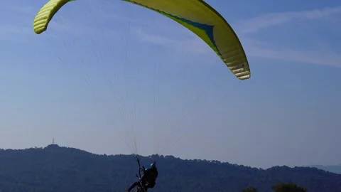 Soaring High: Paragliding Adventures in the Sky Over Bir Himachal Video stock 256138657