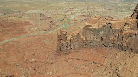 Soaring Over Giants: Aerial View of Sandstone Buttes in Monument Valley Vídeo Stock 264013689