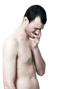 Sobbing topless man Stock Photos