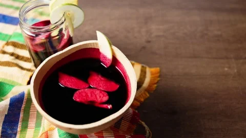 Sobolo: Hibiscus drink with pineapple peels, ginger, cloves &amp; sweetener 動画素材 346249108