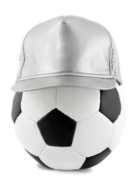 Soccer ball and cap Stock Photos