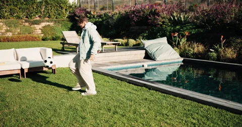 Soccer, ball and kid in backyard at house for practice, exercise or sports game Stock Footage 338112009