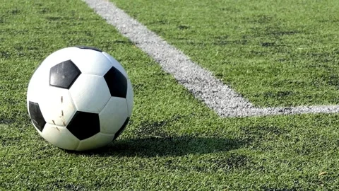 Soccer ball on artificial grass field Video stock 336399062