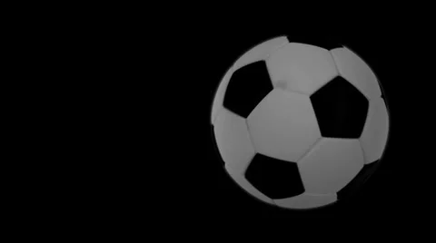 Soccer ball flies at the camera then stops but keeps rotating. Stock Footage 39308215