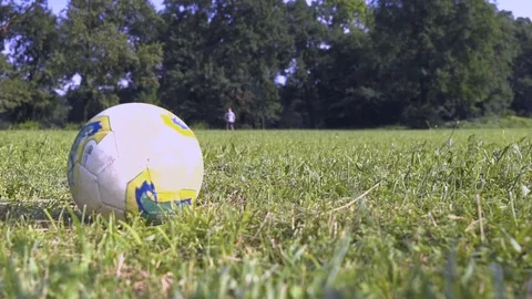 Soccer Ball Kicked by Boy Stock Footage 83159895