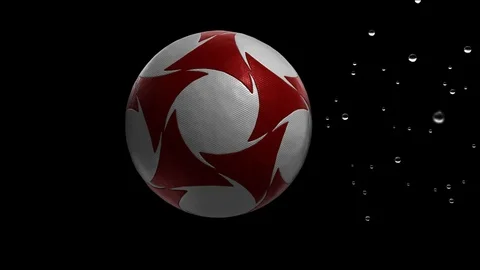 Soccer ball moving through raindrops in slow motion Stock Footage 73564780