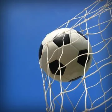 Soccer ball in net Stock Photos