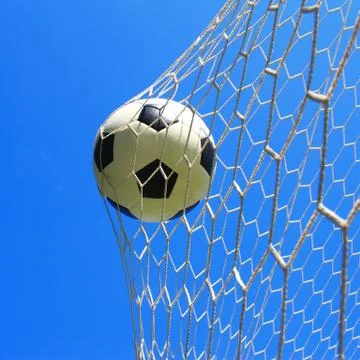 Soccer ball in net Stock Photos