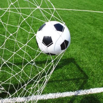 Soccer ball in net 스톡 사진