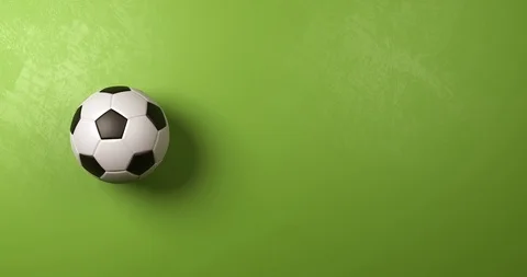 Soccer Ball Rotating on Green Background with Copyspace Stock Footage 85940313