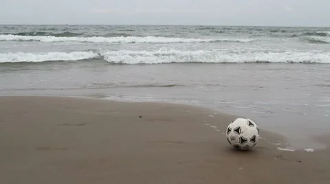 Soccer ball on the shore. Stock Footage 7763280