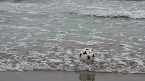 Soccer ball on the shore. Stock Footage 7763705