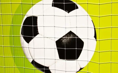 Soccer ball on the wall. Stock Photos